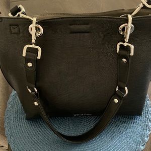 Calvin Klein shoulder purse with silver hardware with metal closure